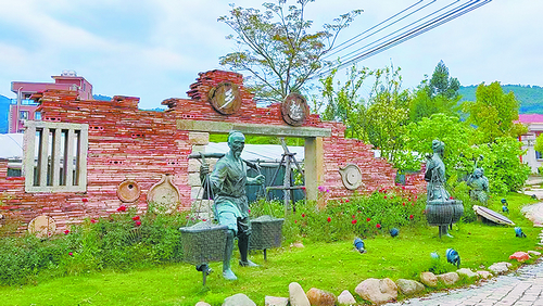 美丽乡村绘新景 村美民富幸福来